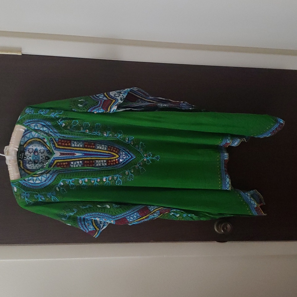 Green Tunic or swimsuit coverup. One size "free size".  100% Rayon.